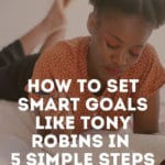 woman writing goals with goal setting worksheet free template